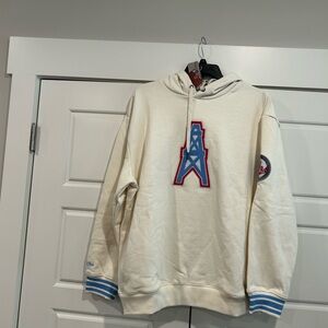 Throwback Houston Oilers now Tennessee Titans Mitchell Ness hoodie.